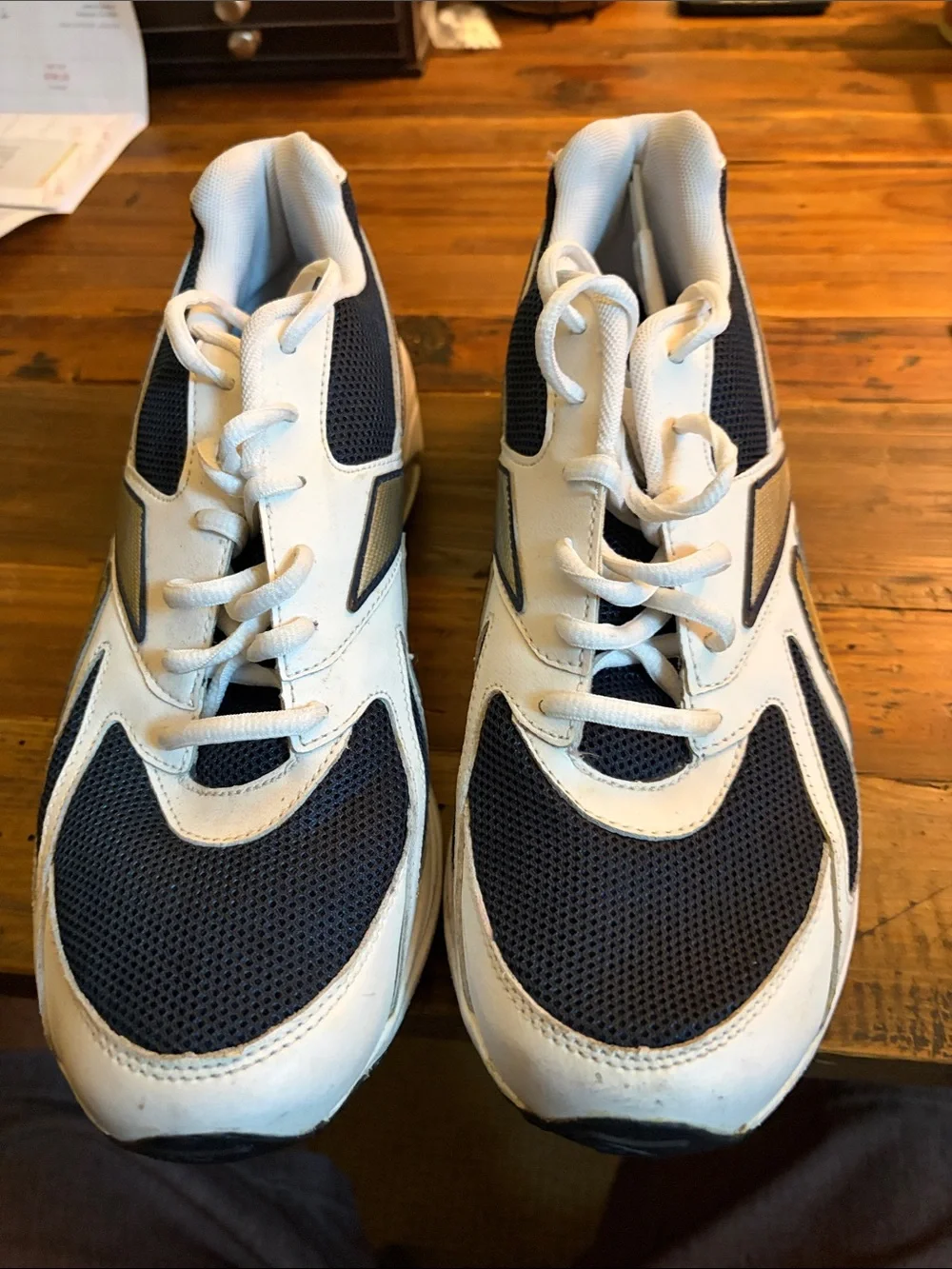 Like New Reebok size 10.5 Men's White and Navy Athletic Sneakers with Gold Accen